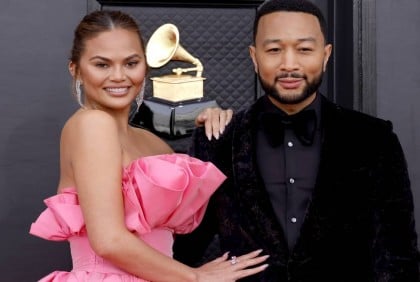 Chrissy Teigen reveals baby bump