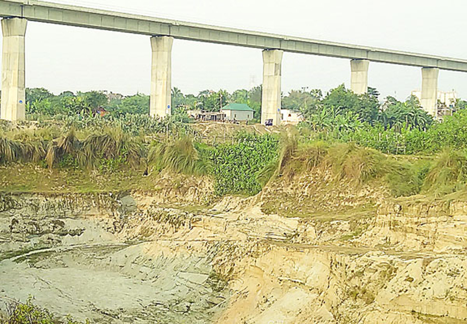 Local syndicates cutting topsoil in South Keraniganj 