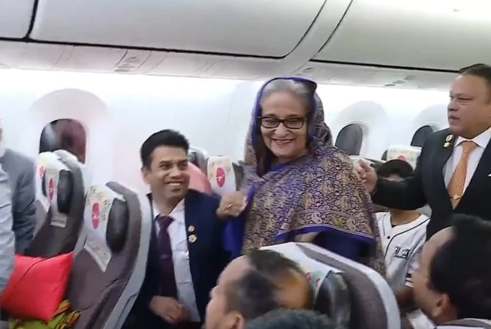 PM takes regular commercial flight on the way home from Geneva