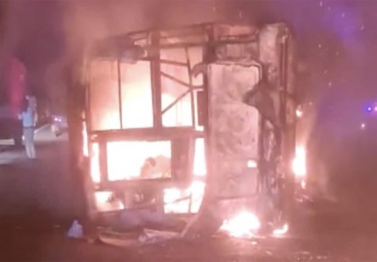 25 dead after fire catches crashed bus in western India