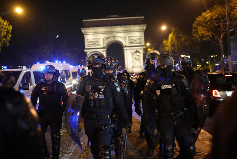 Mourners bury slain teen in France as 45,000 police are deployed and 5th night of unrest is quieter