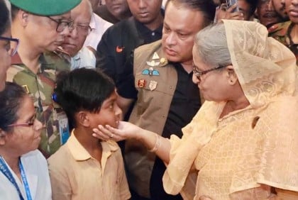 During checkup at Nat’l Eye Hospital, PM; takes over 11-year-old Rabbi’s responsibility