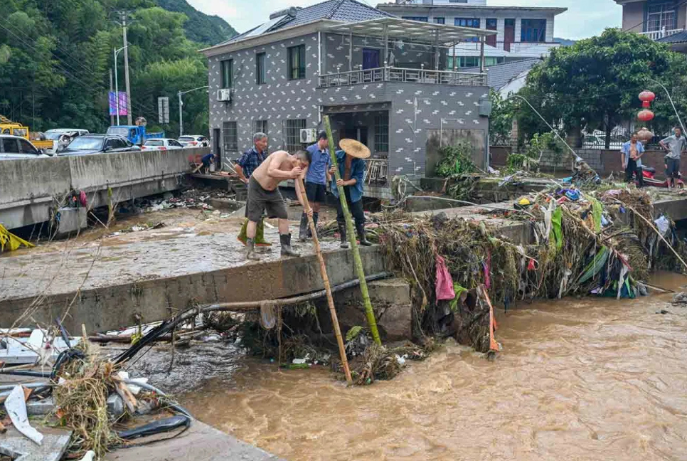 Flooding and a landslide in eastern China leave 5 dead and 3 missing