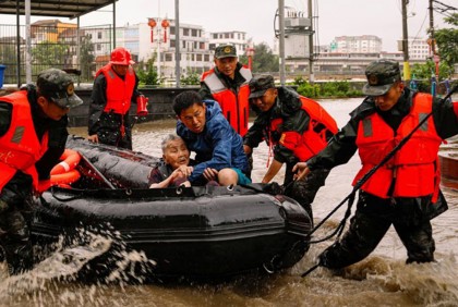 Tens of thousands evacuated as northern China hit by torrential rain