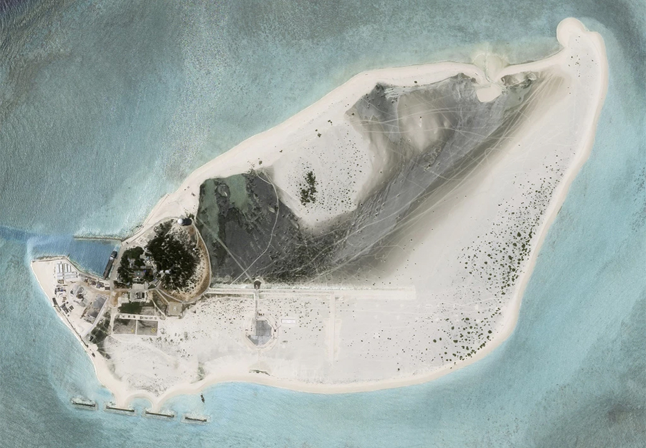 China likely building airstrip on a disputed South Sea island