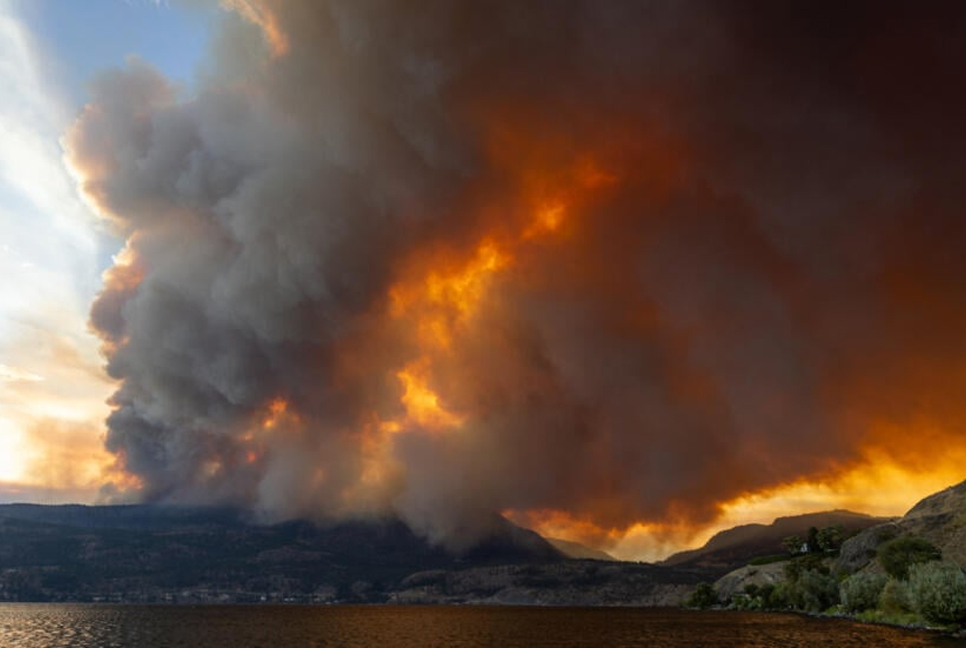 Western Canada wildfires force tens of thousands to flee