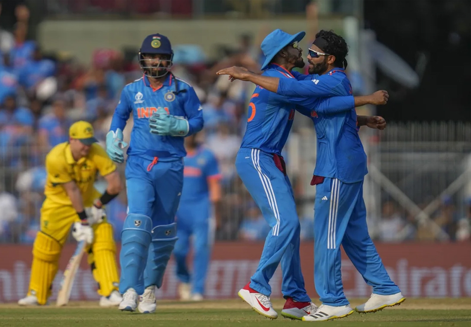 India restrict Australia to 199  