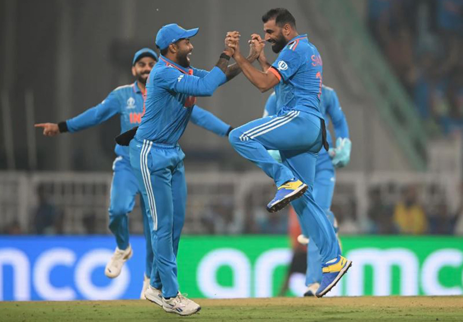 India beat champion England by 100 runs  