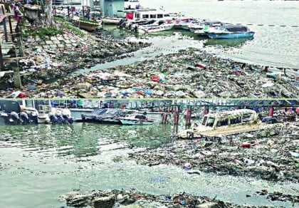 Encroachment, pollution destroying river Kirtankhola 
