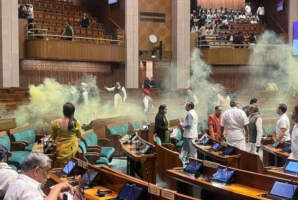 Security breach at Indian parliament as intruders 'throw smoke bombs