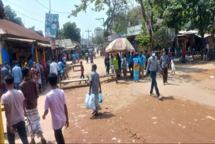 Workers protesting for salary, Eid bonus block  road in Gazipur