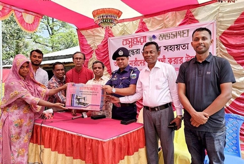 20 women get sewing machines in Natore