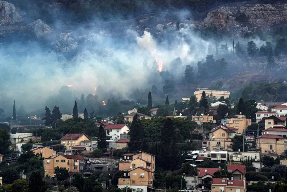 Hezbollah fires 200 rockets at Israel after senior commander killed