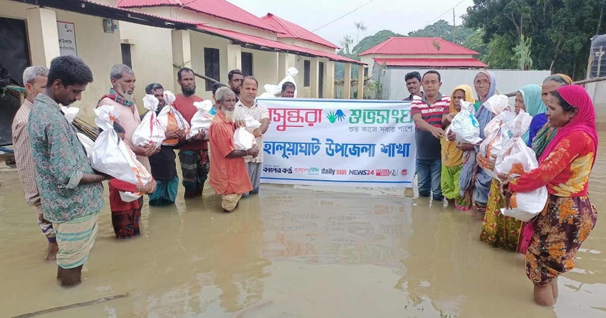 Shuvosangho distributes food aid among flood victims in Haluaghat