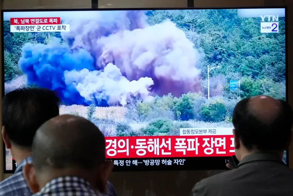 North Korea blows up roads to South Korea as military tensions escalate