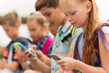 Is your child's back hurting? Screen time, heavy backpacks, obesity blamed