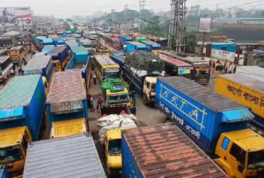 RMG workers blocked the Nabinagar-Chandra Highway, causing traffic jam