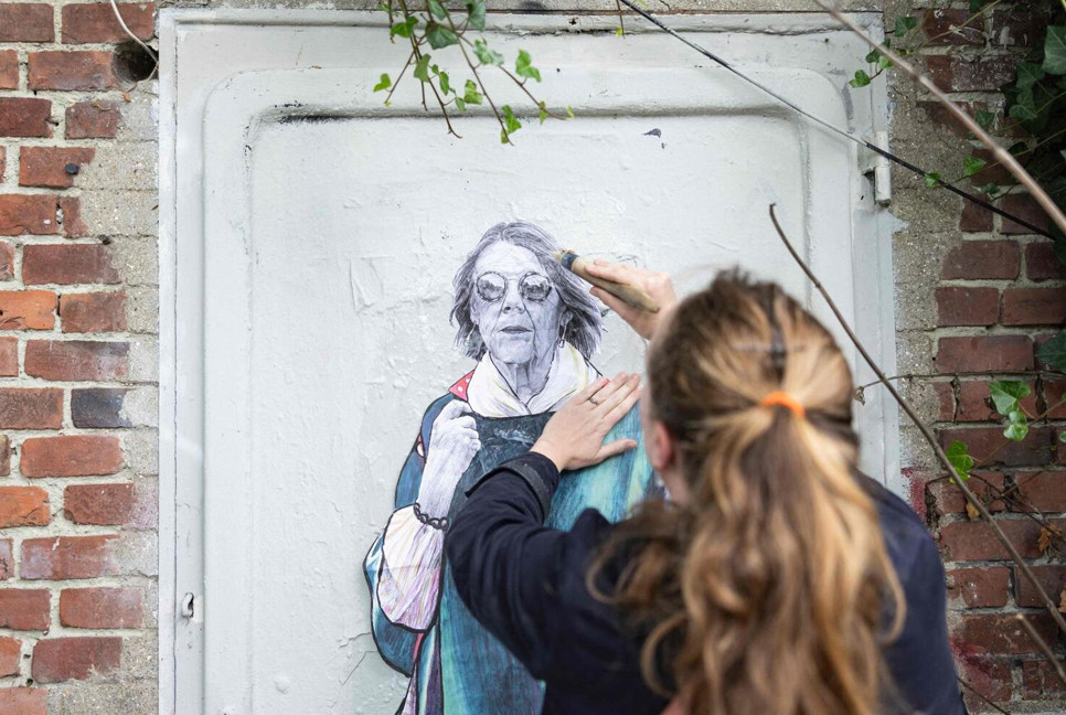 French street artist pays tribute to victim in mass rape trial