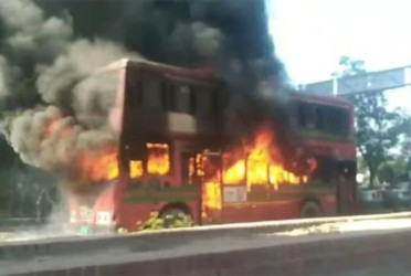 BRTC bus catches fire on Kuril Bishwa Road