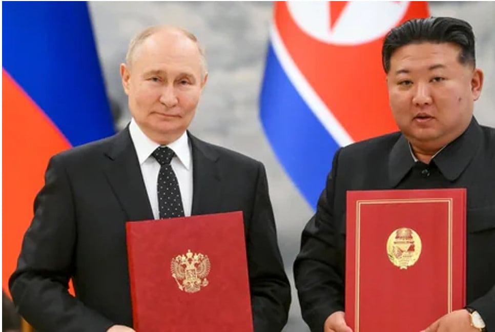 Vladimir Putin signs mutual defense treaty with North Korea