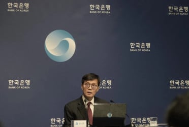 South Korea's central bank cuts a key rate to nurse a slower economy