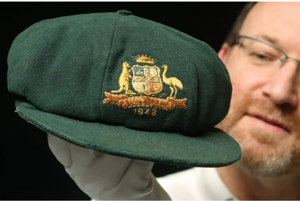 Bradman's iconic 'Baggy Green' cap expected to sell at an auction in Sydney for $260,000