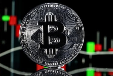 Bitcoin hits $1,00,000 for first time