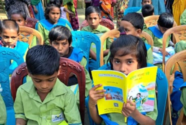 New textbooks bring joy to kids of Bashundhara Shuvosangho School