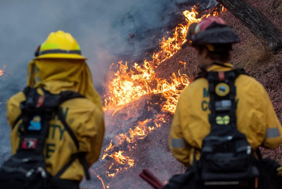 Wildfires near Los Angeles kill 16 as firefighters race against time