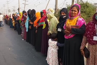 Workers form human chain demanding opening of 16 Beximco factories