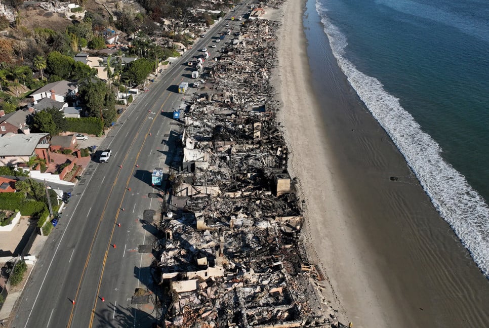 Firefighters gain ground on LA wildfires as conditions improve