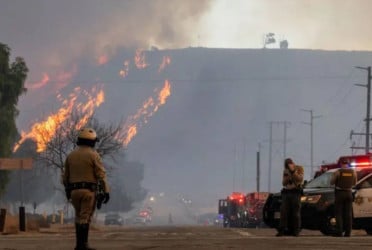 Thousands evacuated as new fire ignites near Los Angeles