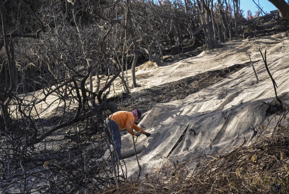 Rain will aid Southern California firefighters but create a risk of toxic ash runoff