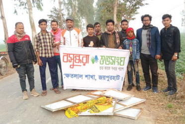 Shuvosangho removes banners from roadside trees in Joypurhat