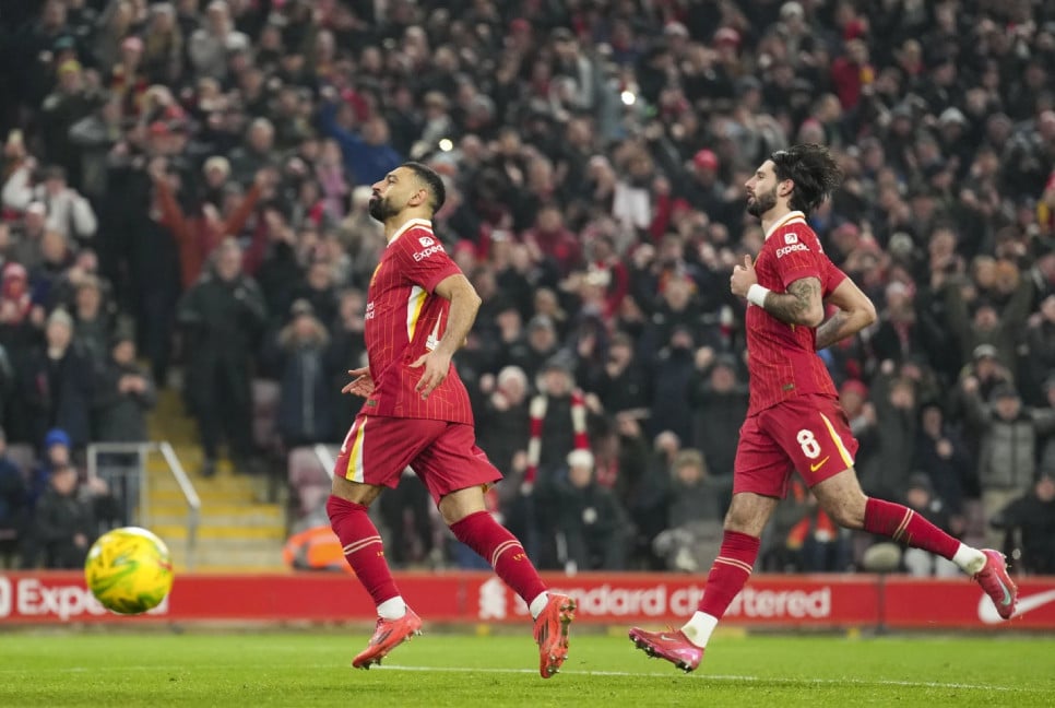 Liverpool routs Tottenham to set up English League Cup final against Newcastle