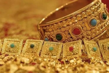 Gold price hits record high of nearly Tk1.50 lakh per bhori