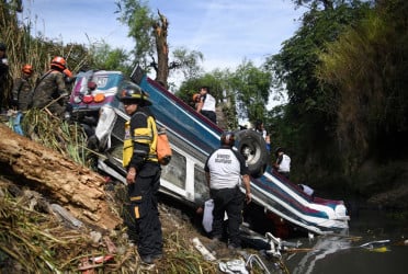 At least 55 dead after Guatemala bus plunges into ravine