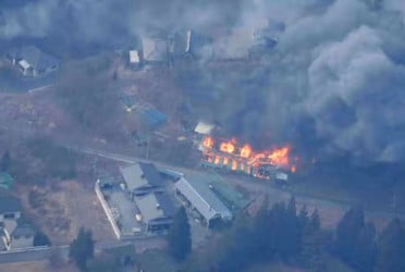 Thousands flee after Japan's biggest wildfire in decades