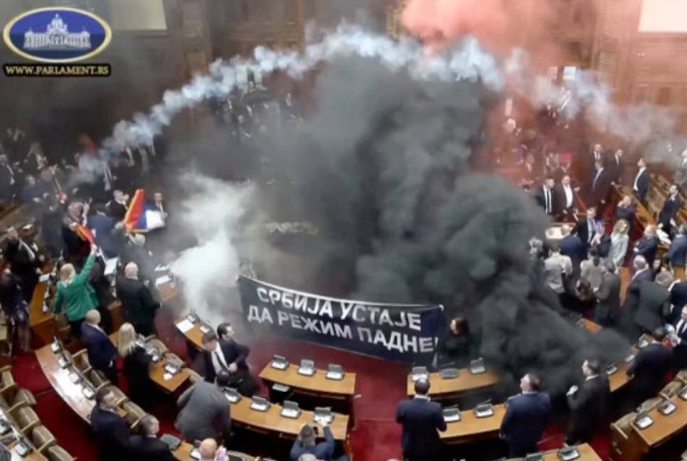 Smoke grenades tossed in Serbian parliament