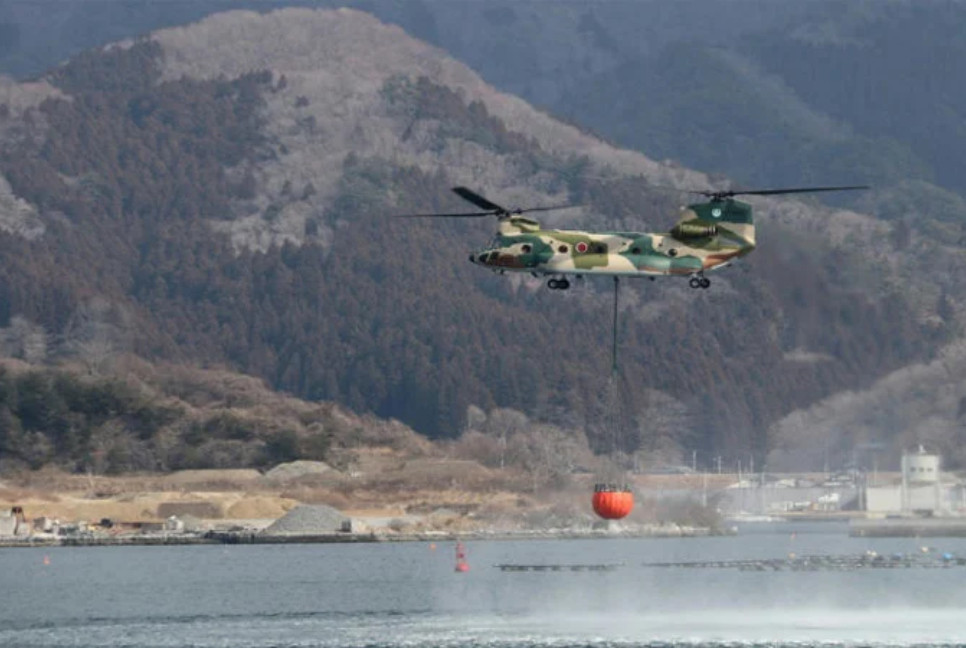 Rain offers relief as Japan battles worst wildfire in 50 years