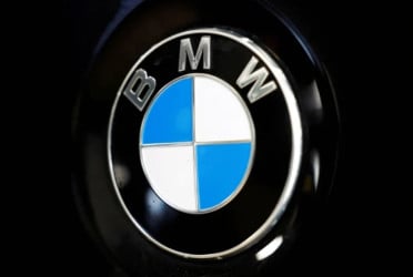 BMW warns on tariffs, China as 2024 profits plunge