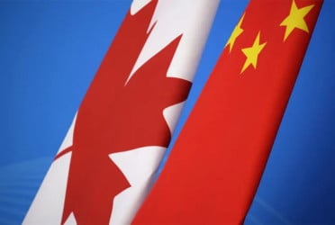 China says acted 'in accordance with the law' after Canadians executed