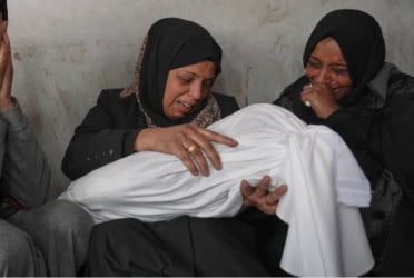 Israel kills 21 in attacks on Gaza