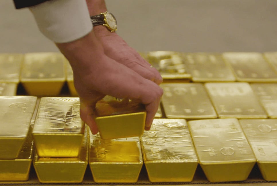 China's gold investing jumps as Comex Spec's cut bullish bets in half