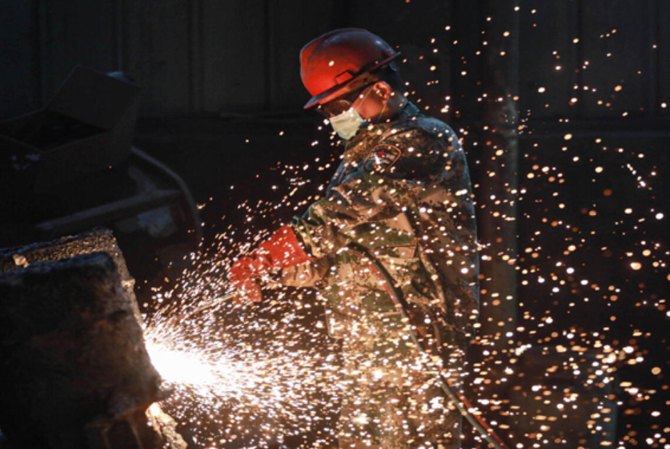 China's manufacturing shrinks in April as trade war bites