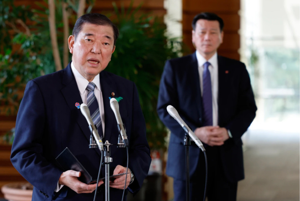 Japan maintains delicate ties with US and China amid tariff threats