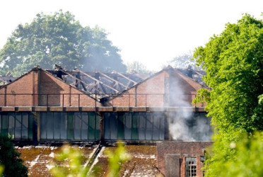 2 firefighters among 3 killed after fire tears through former RAF base in UK