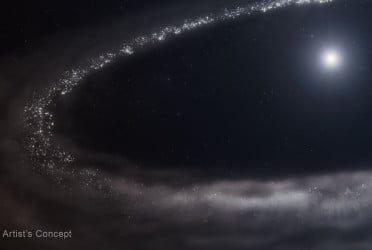 Webb telescope detects frozen water in distant star system for first time
