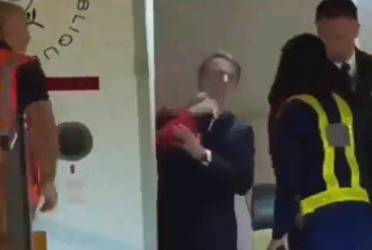 French President slapped by wife on Vietnam arrival?