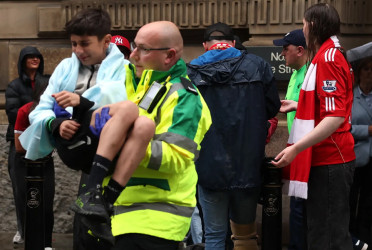 Car ploughs into football fans at Liverpool parade, 50 injured including children